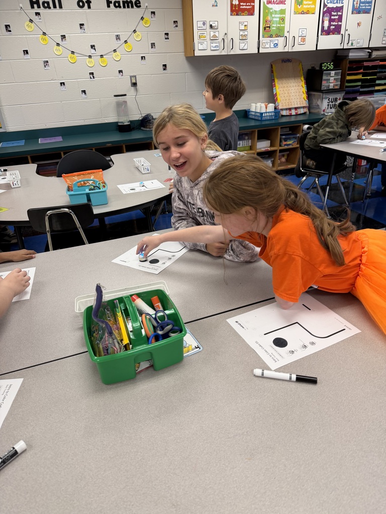 Students coding ozobots during STEM class.