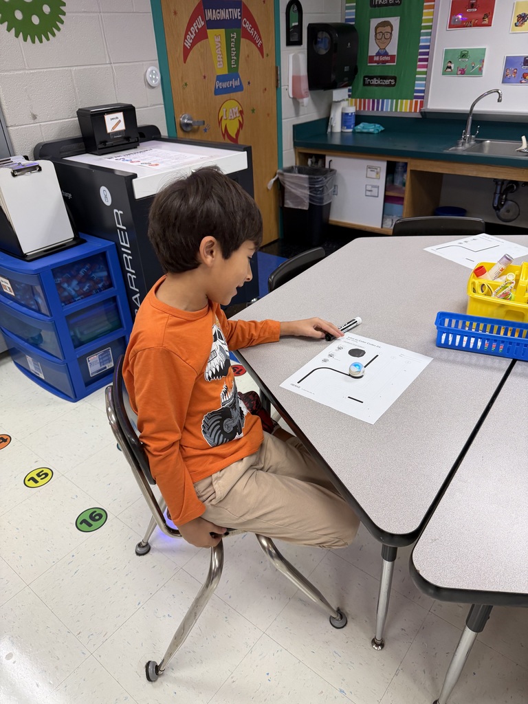 Students coding ozobots during STEM class.