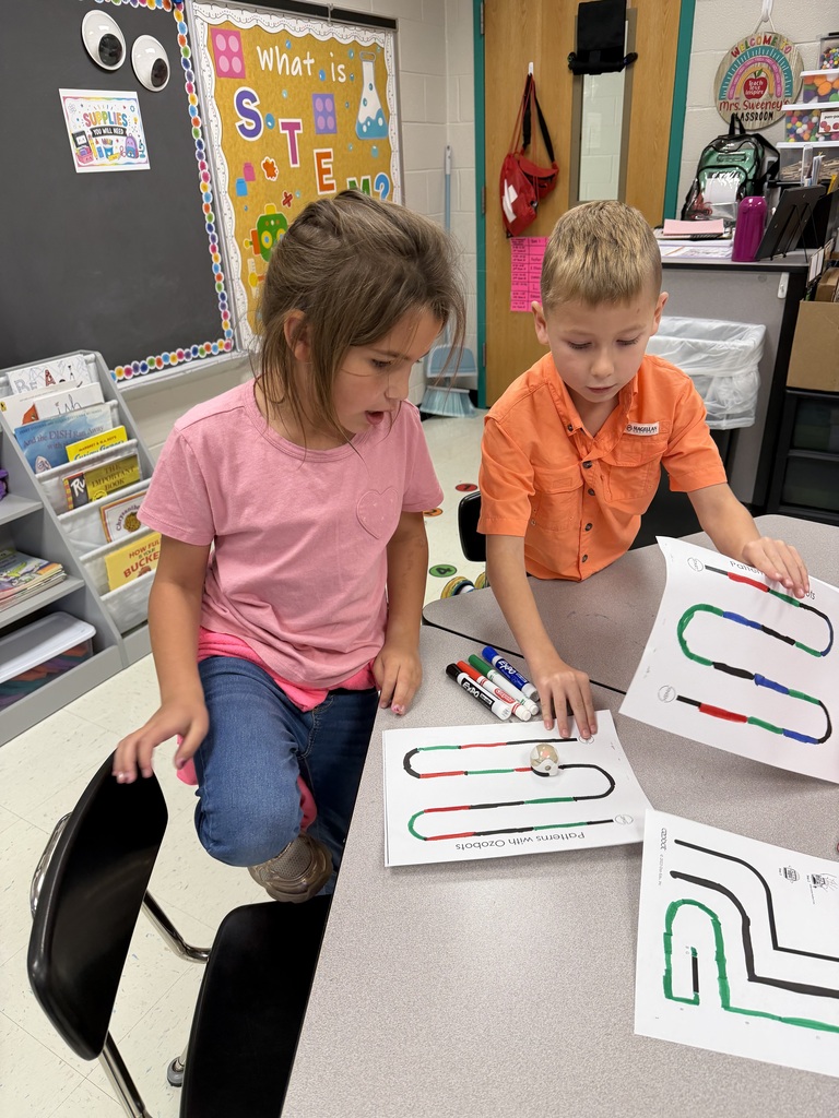 Students coding ozobots during STEM class.