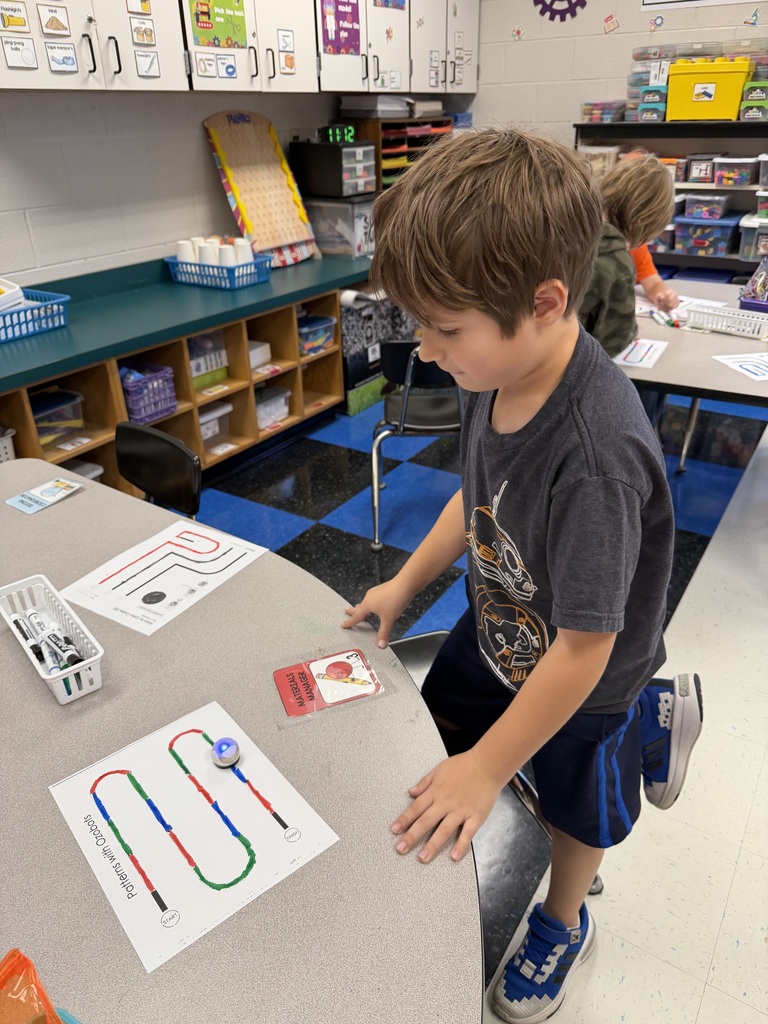 Students coding ozobots during STEM class.
