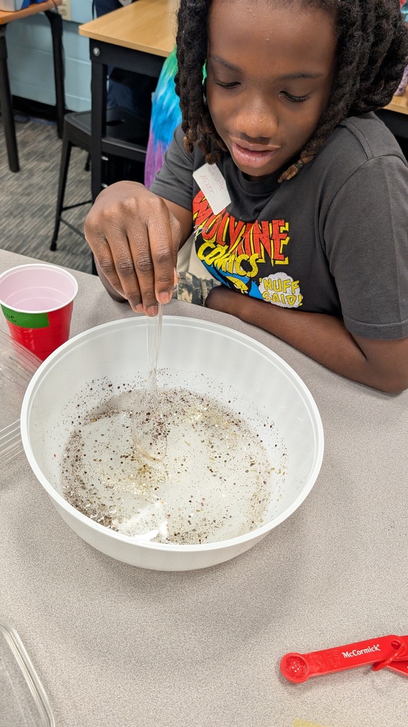 Students investigating slime