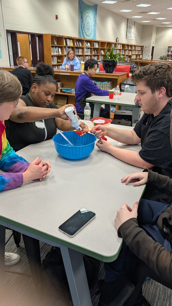 Students creating slime