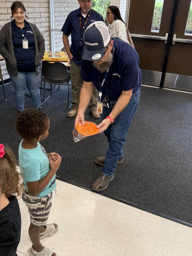 Students receiving Optimum swag