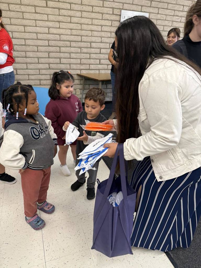 Students receiving Optimum swag