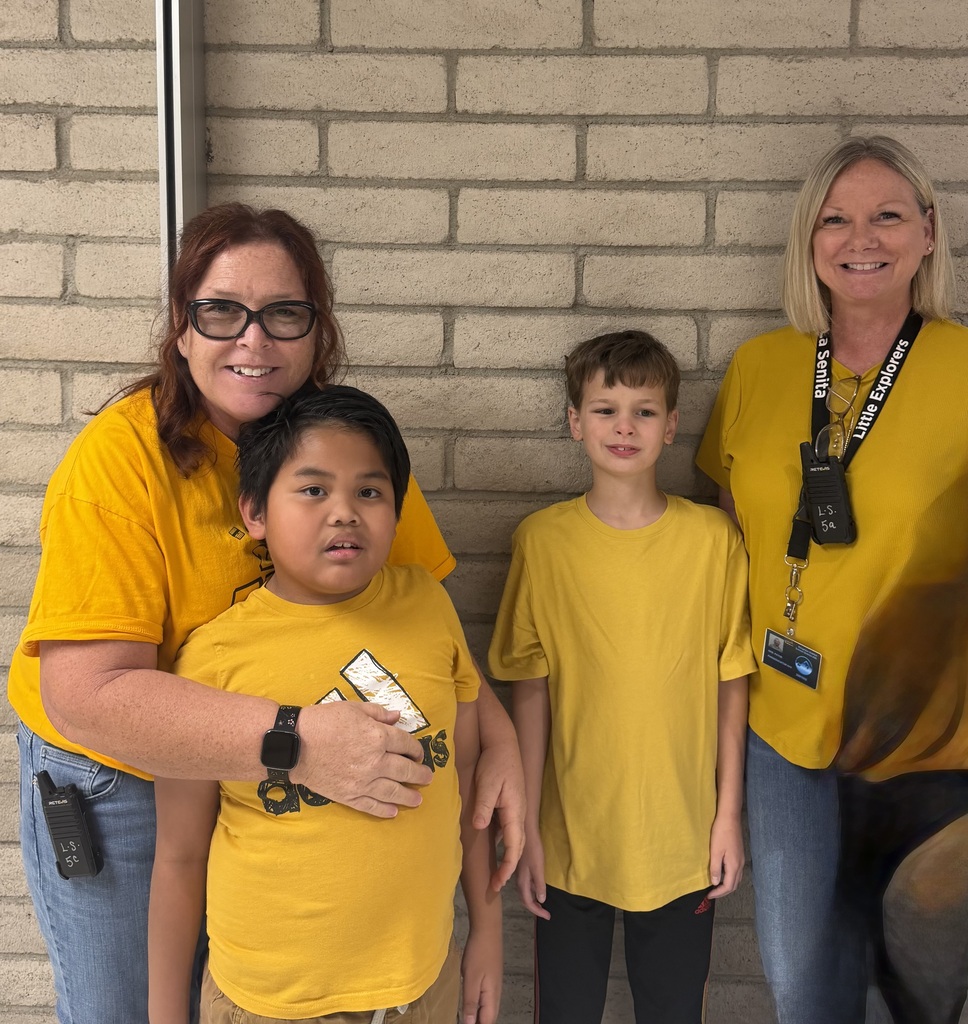 Staff wearing gold