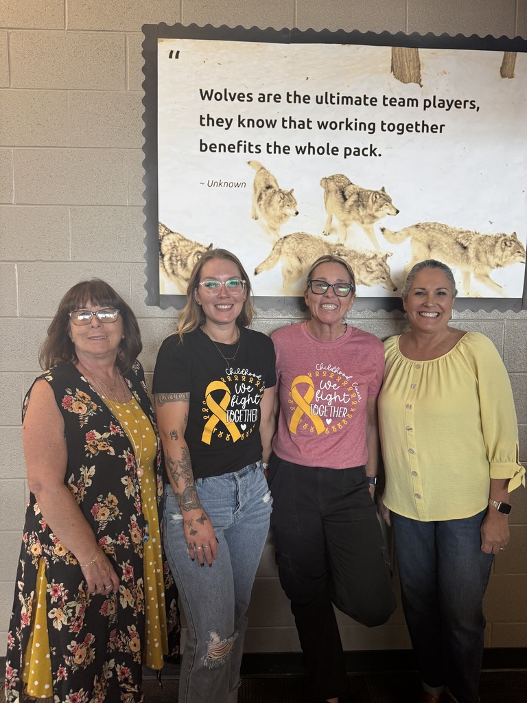 Students and Staff wearing GOld