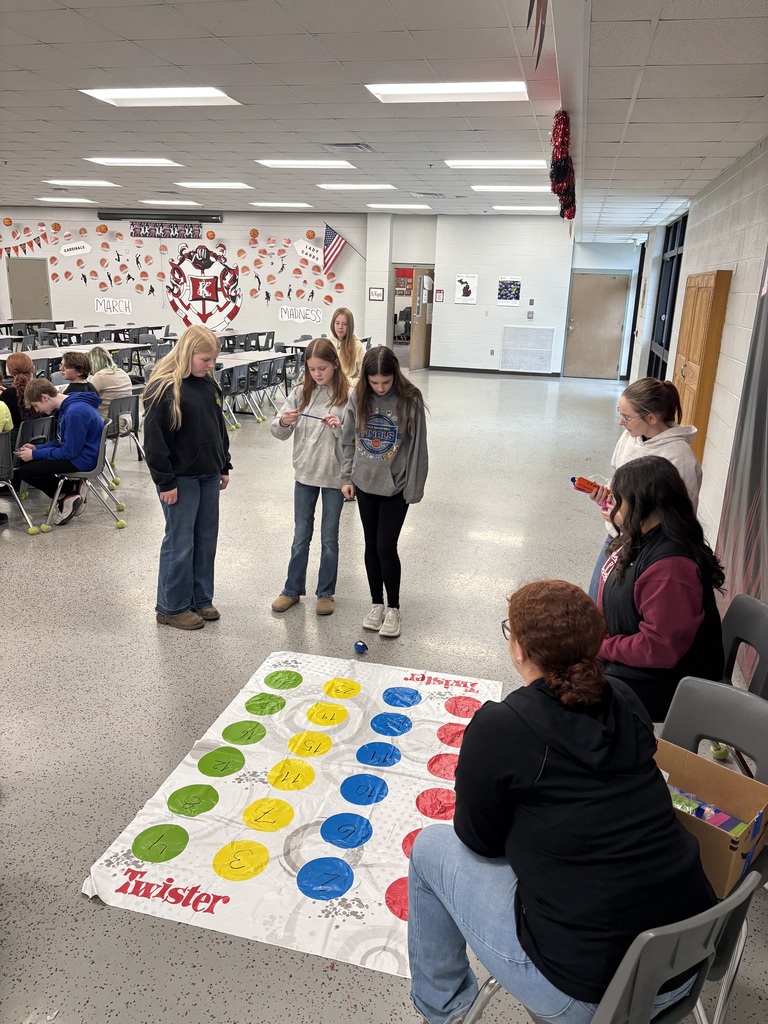 junior high students playing a game led by P2P students