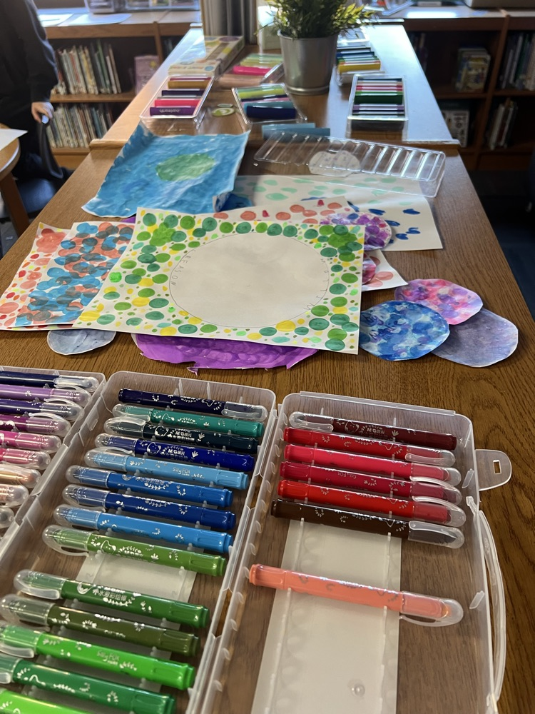 Students used crayons, markers, colored pencils, and paint sticks to create their masterpieces. 