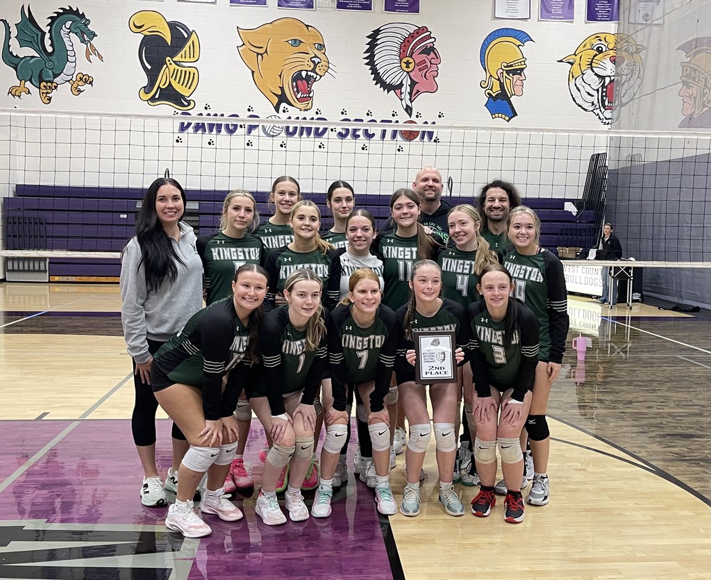 Varsity Volleyball takes picture with trophy from 2nd place finish at West County Tournament
