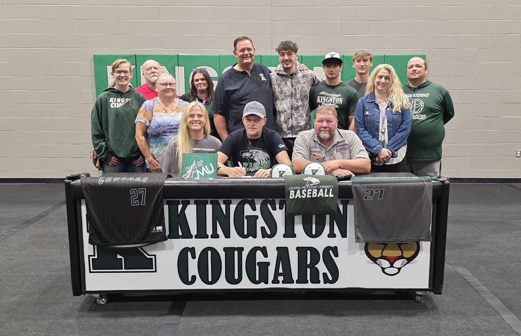 Joey Hahn with family, coaches, and supporters