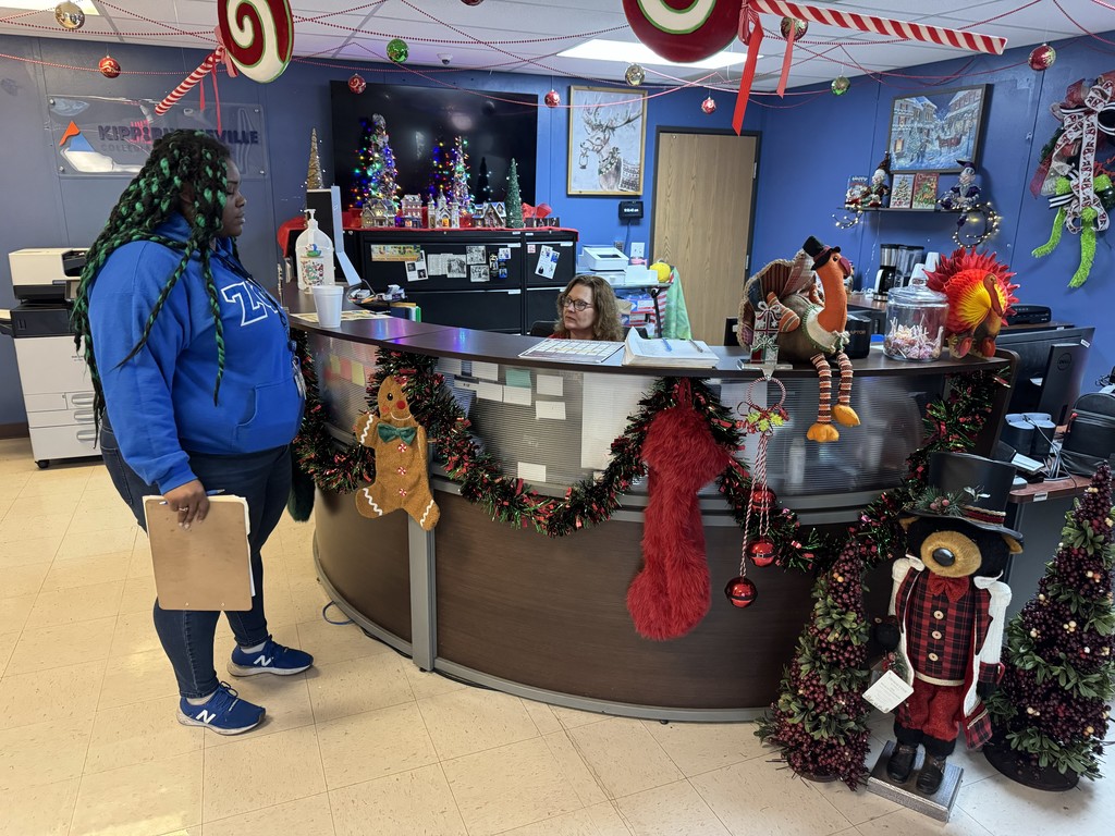 KIPP Instructional Coach, Tamara McKnight speaks with Student Information Manager, Carla Bivens