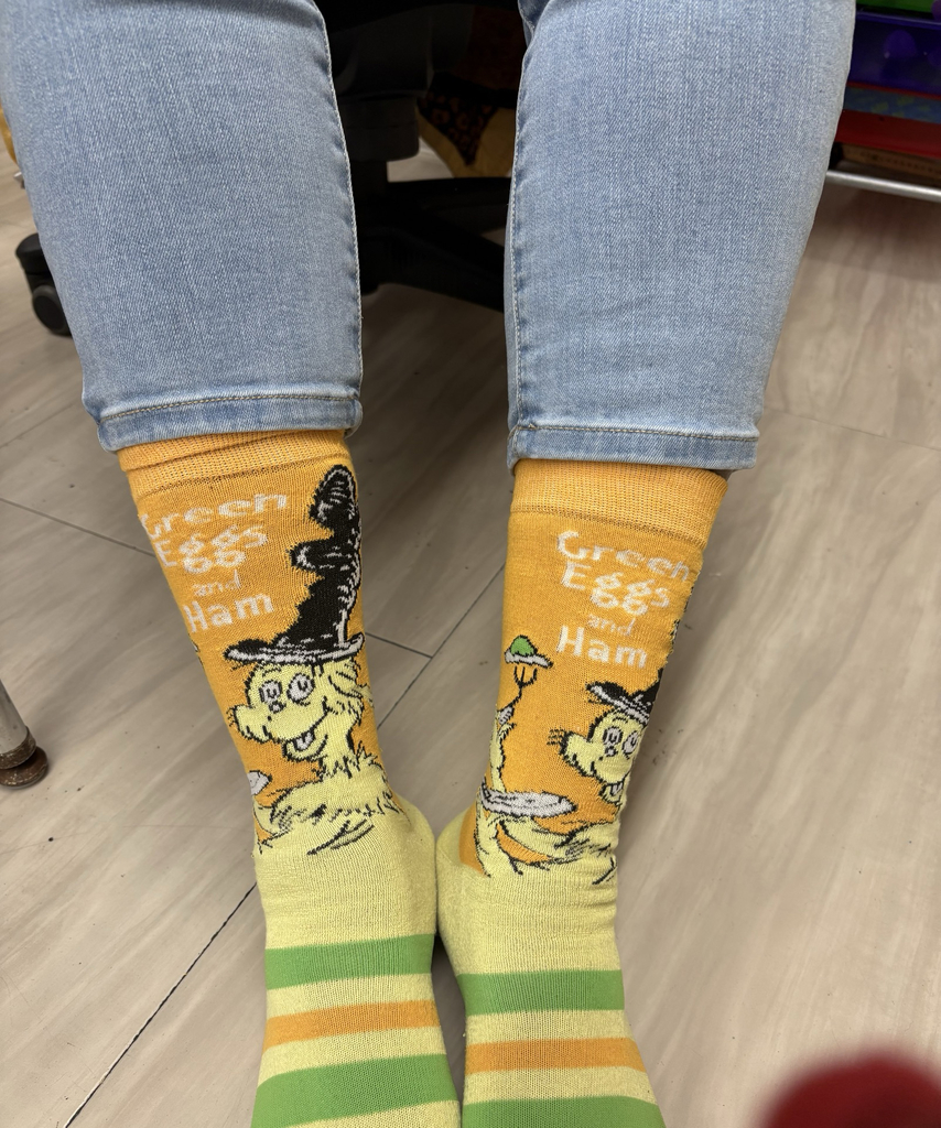 Mrs. Sharp shows off her socks for "Green Ham and Eggs" day!
