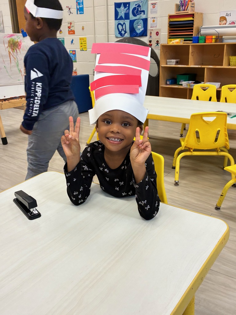 H. Eggleston is showing off her Dr. Seuss hat that she made in preschool!