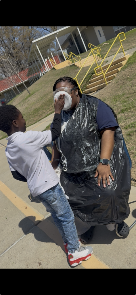They say a picture is worth a thousand words, but this one is just worth one: SPLAT! 💥 Ms. Jackson take a pie to the FACE!!!!
