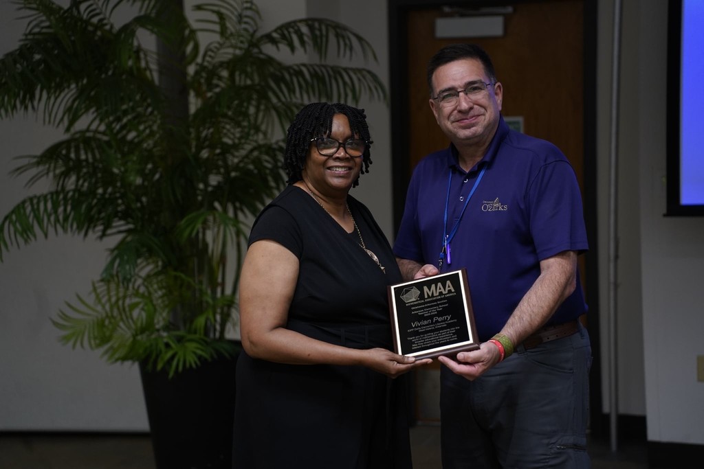Vivian Perry receiving her award for Teacher of the Year from the Mathematical Association of America
