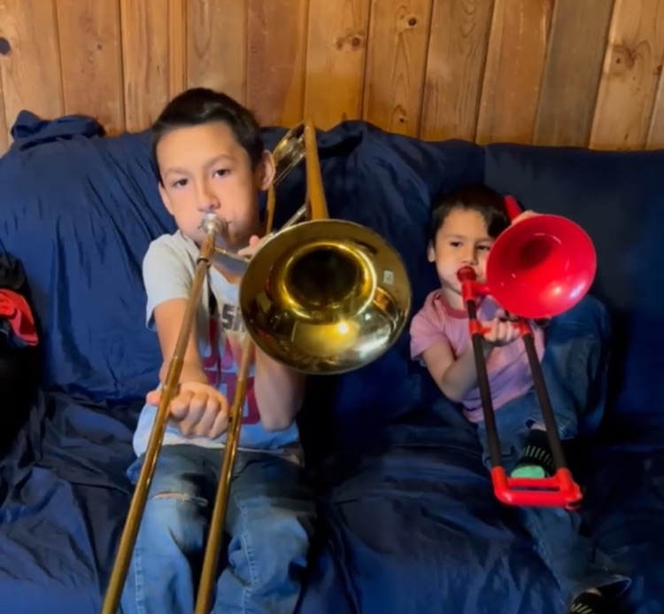 brothers with trombones