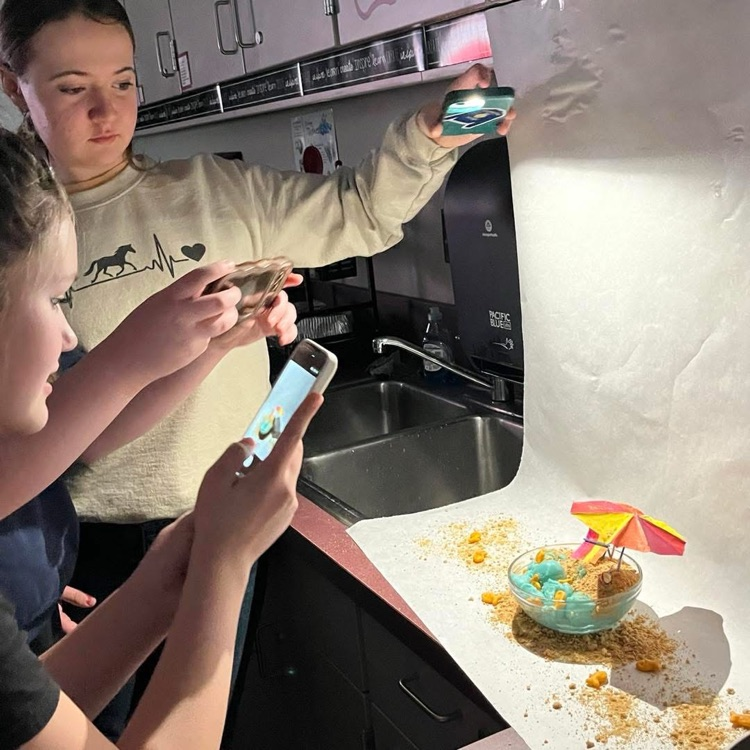 student photographing their ice cream project