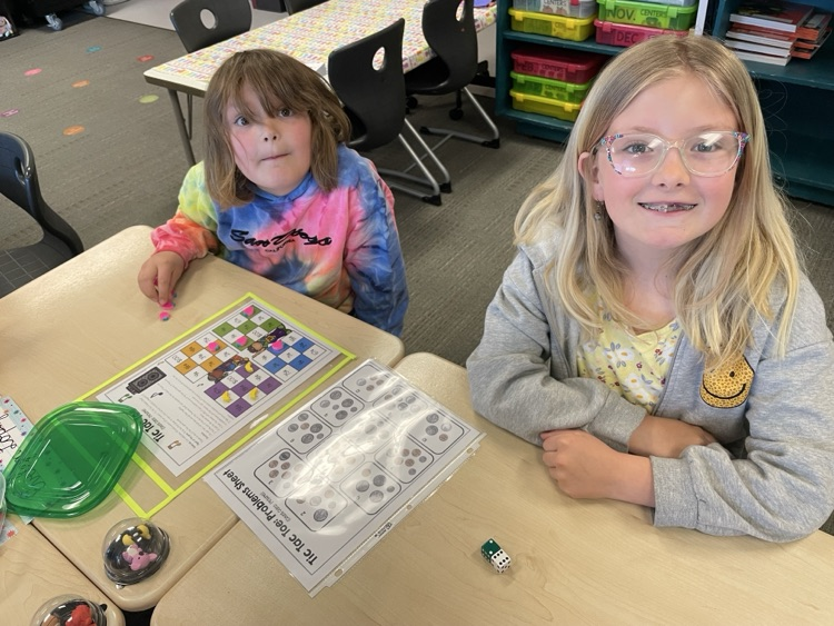 students playing tic-tac-toe