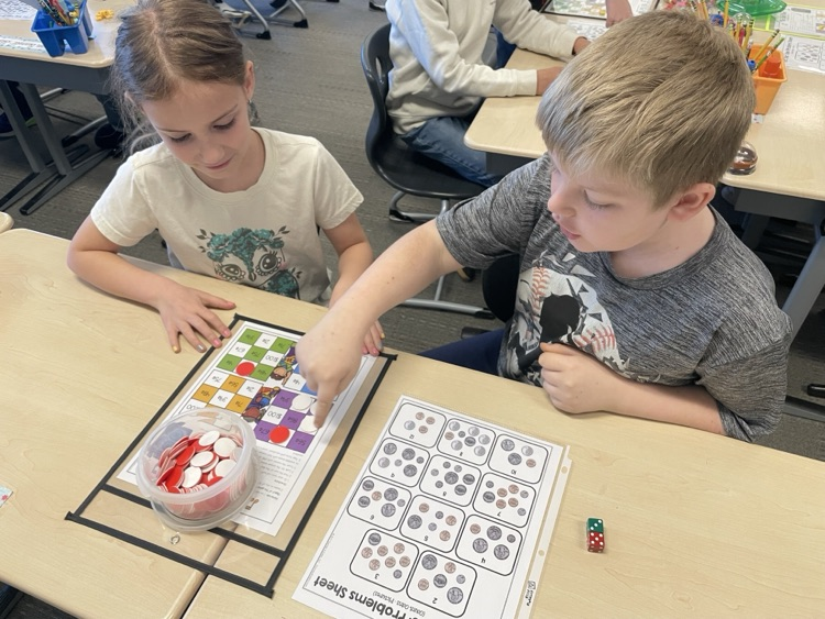students playing tic-tac-toe