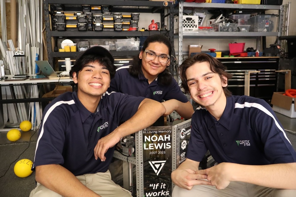 VorTX team leaders with their robot