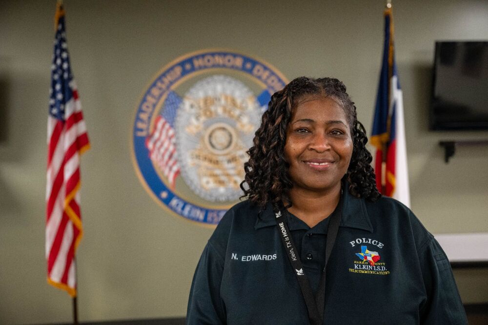 Ms. Edwards smiles at the camera