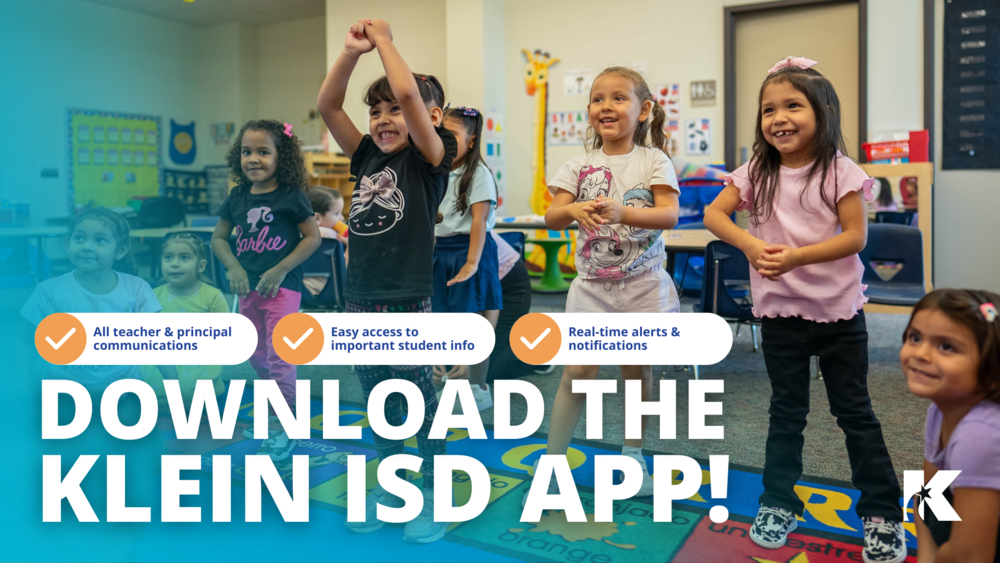 kids jump and smile in classroom