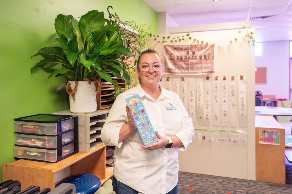ms zadik holds teaching tool