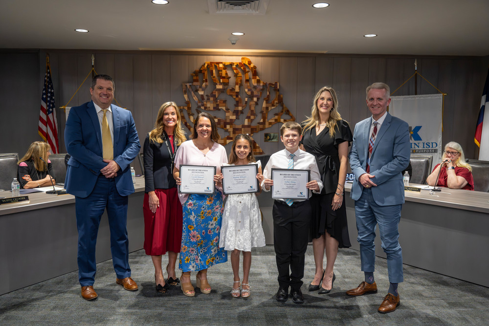 French teacher and students posing