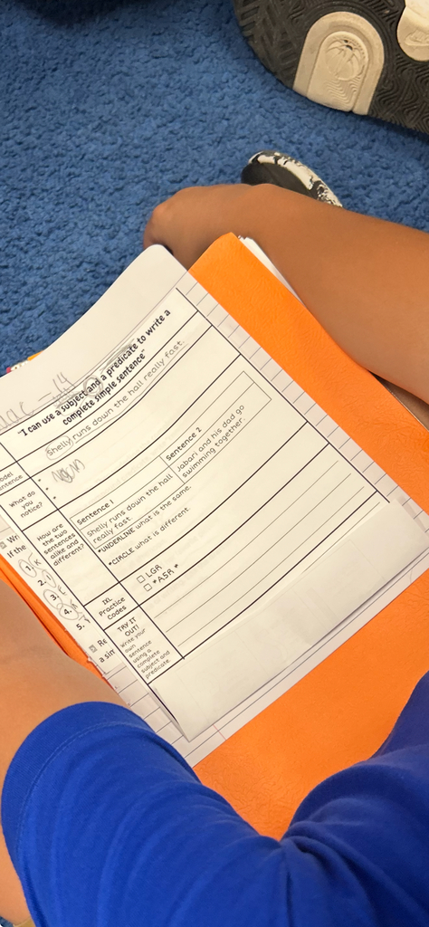 White sheet of paper with orange folder - Think sheets