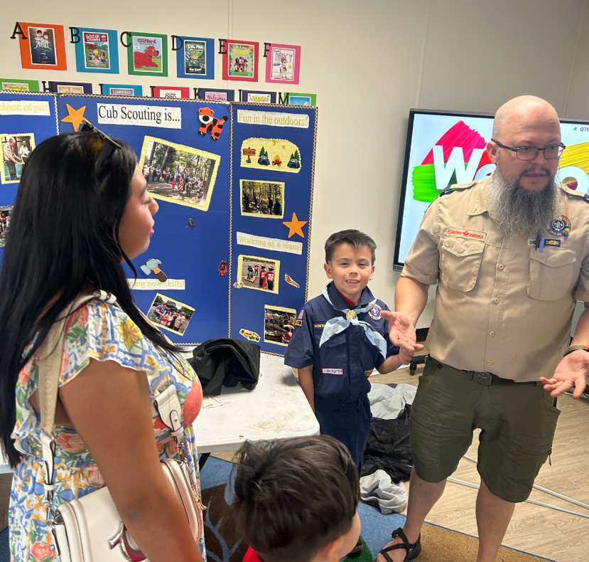 Cub scout with parent 