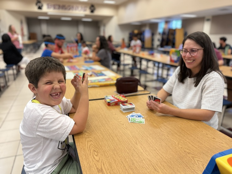 students and families at game night