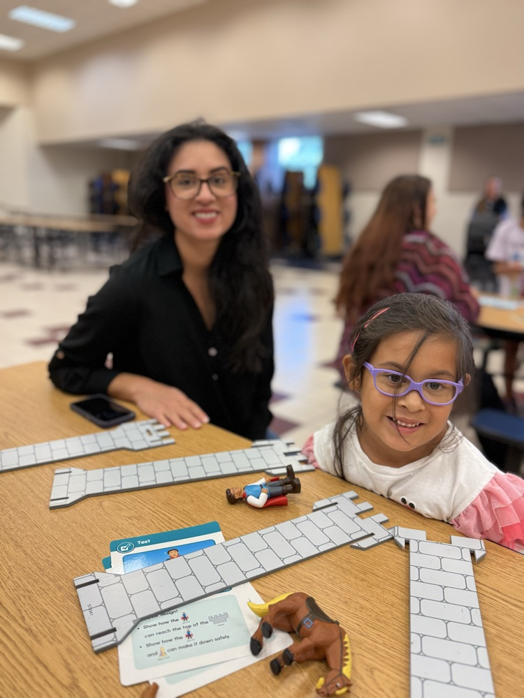students and families at game night
