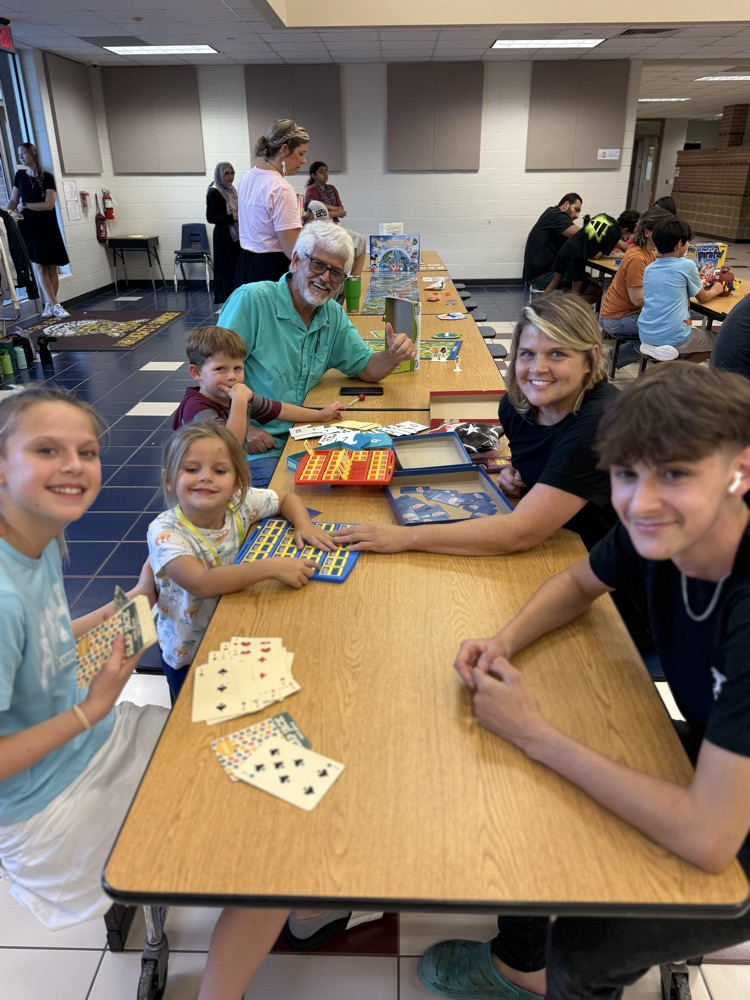 students and families at game night