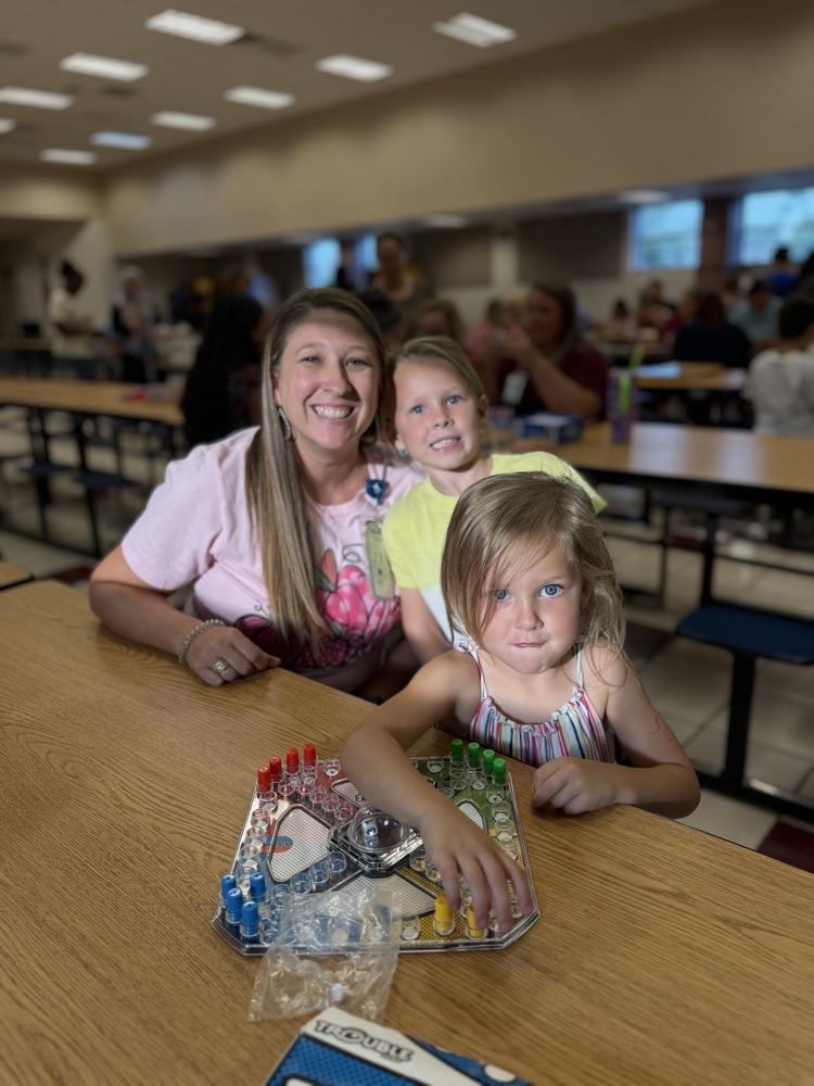 students and families at game night