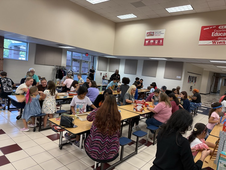 students and families at game night
