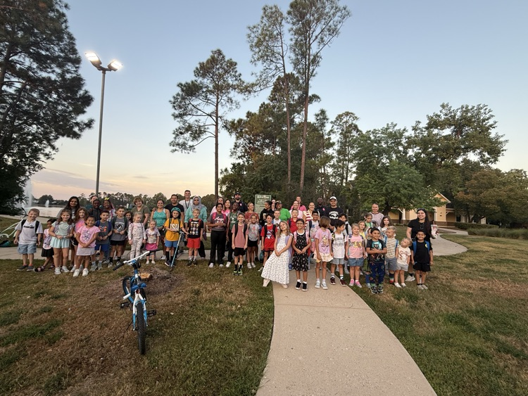 students and families walking to school