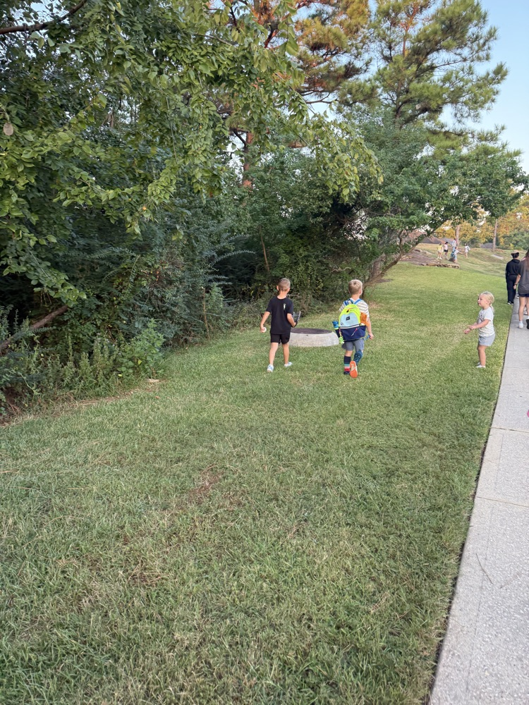 students and families walking to school