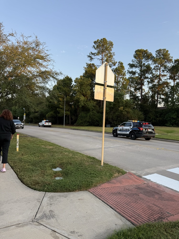 students and families walking to school