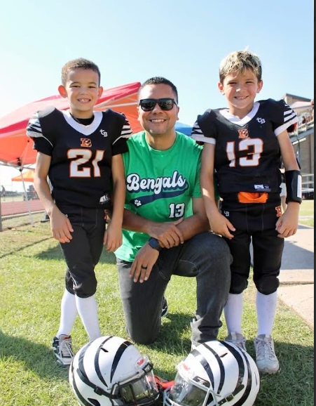 Mr. Menendez at a sporting event supporting students