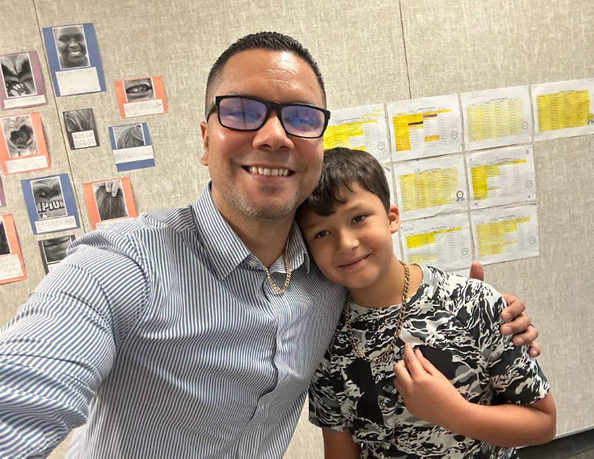 Mr. Menendez with a student