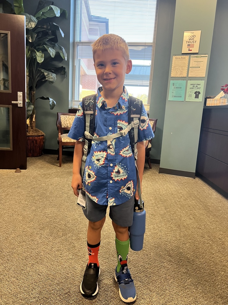 Student poses for mismatch day