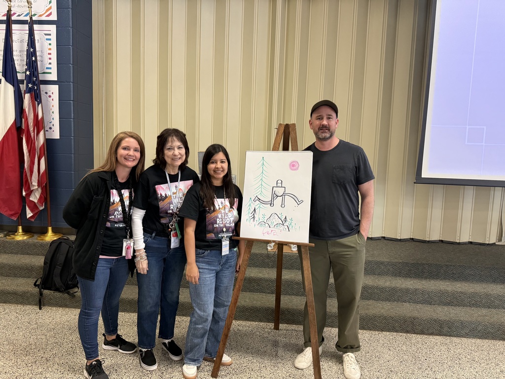 people standing with peter brown and his drawing of roz the wild robot