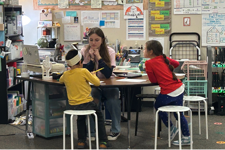 Klein Collins student with a small group of students