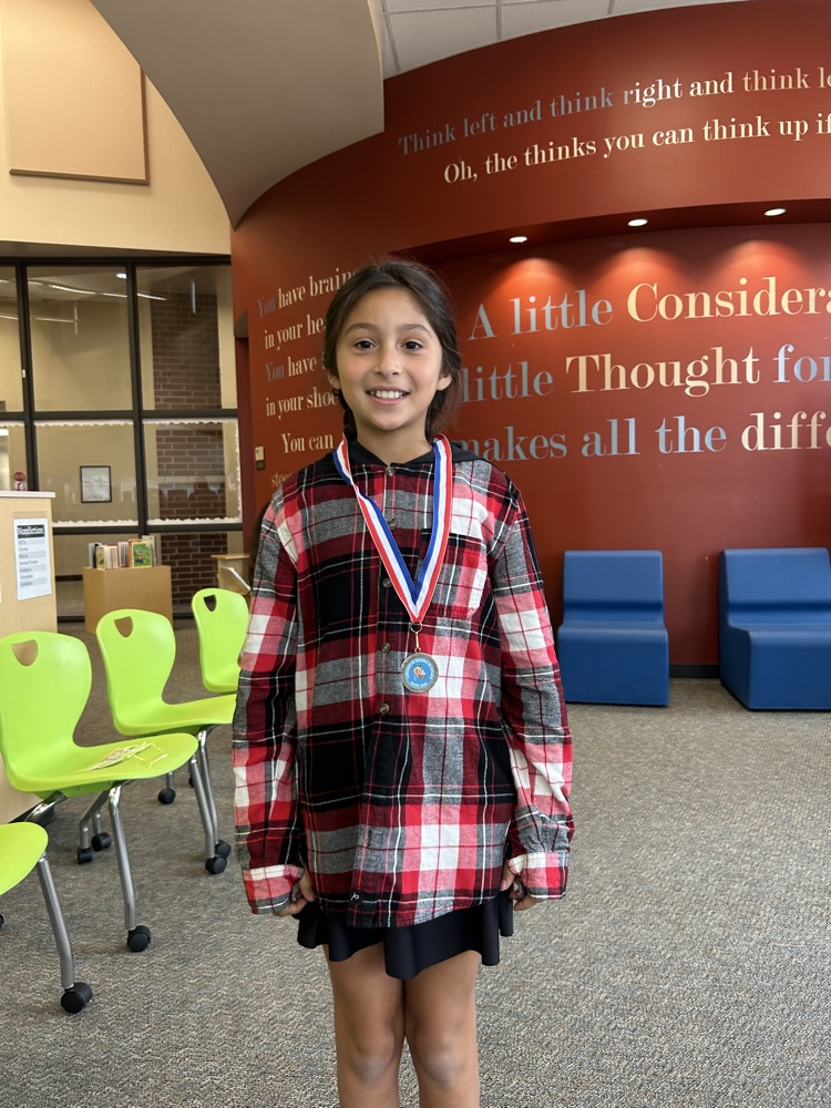 3rd place winner wearing her medal