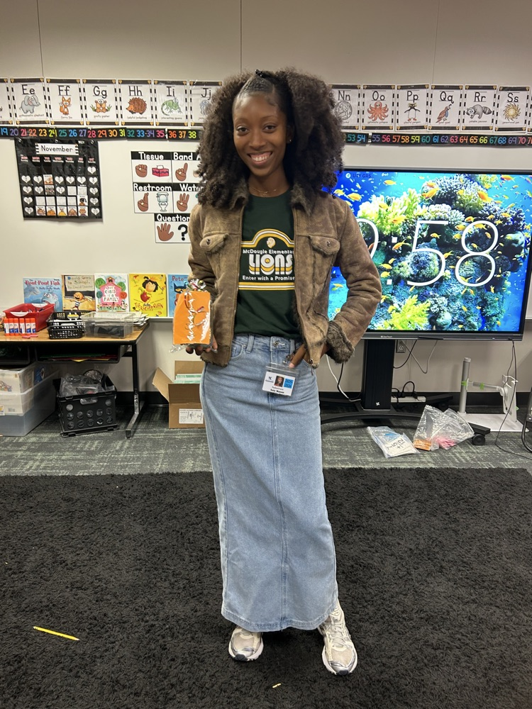 women in jean skirt standing