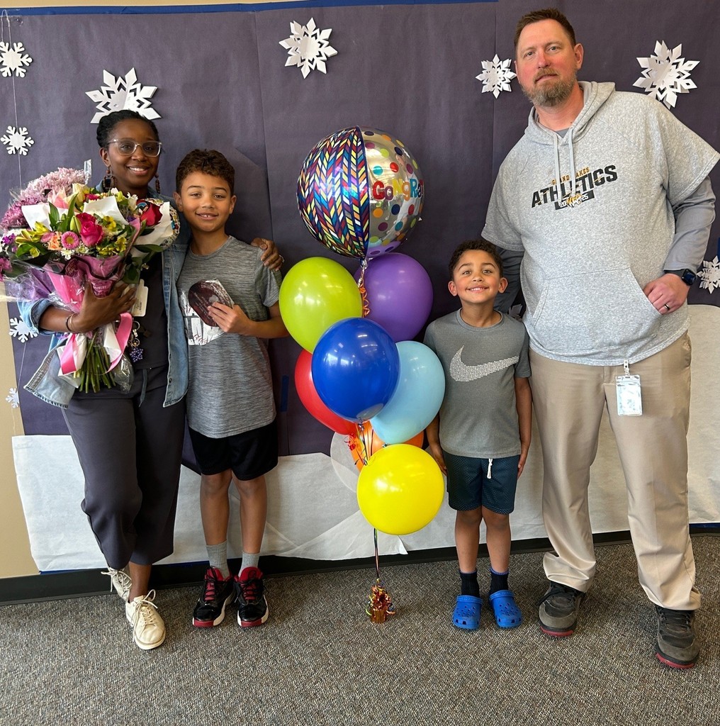 Mrs. Solomonson posing with her family 
