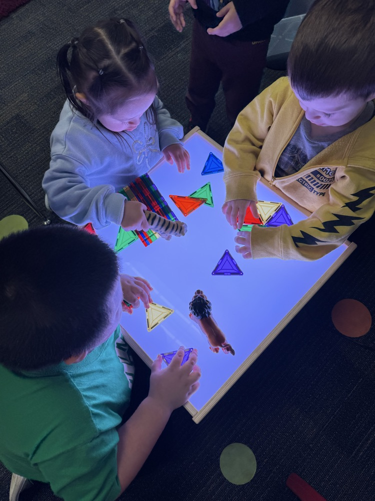 students at sensory table