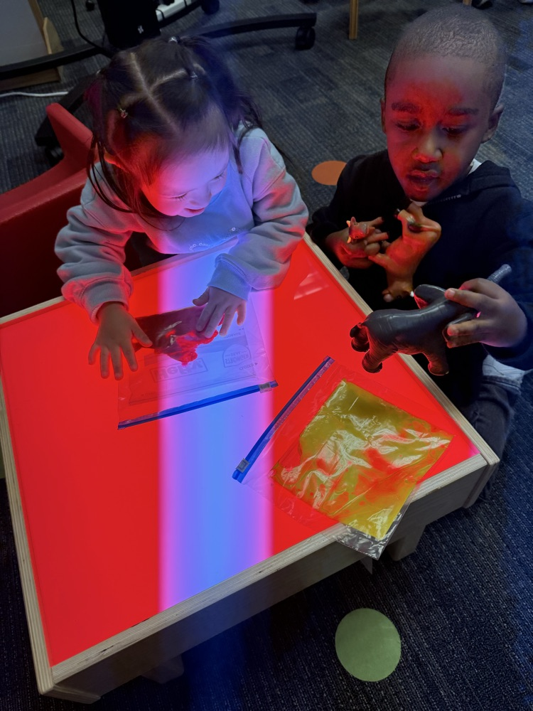 students at sensory table