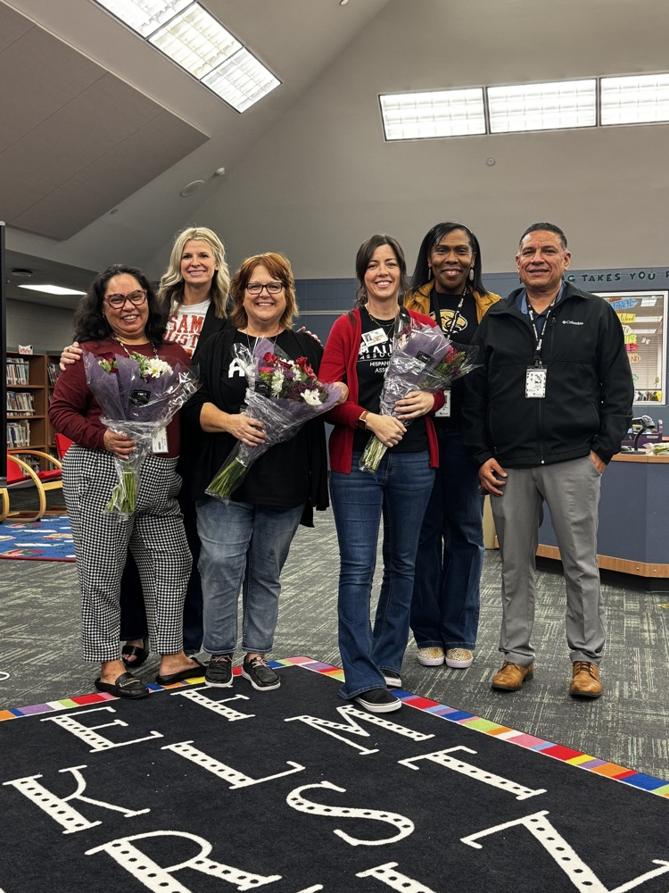 Proud group of educators and support staff.