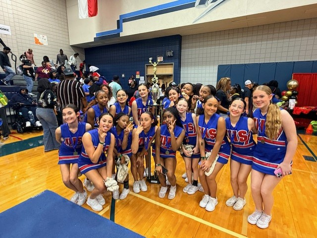 Ulrich cheer team with the 1st place trophy.